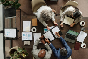 Executive strategist evaluating pricing proposals and market positioning for B2B services