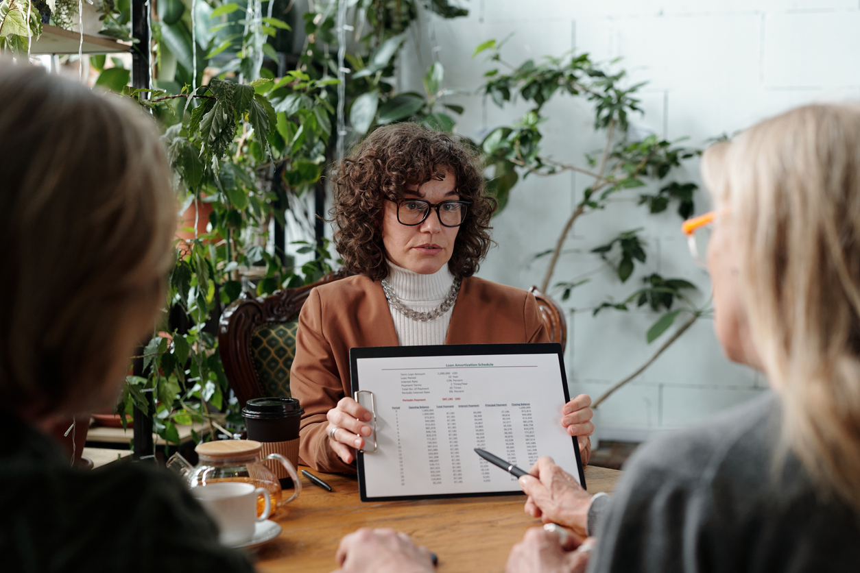 Marketing team analyzing competitive pricing comparison and market-driven price anchoring strategies